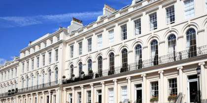 White houses with short balconies