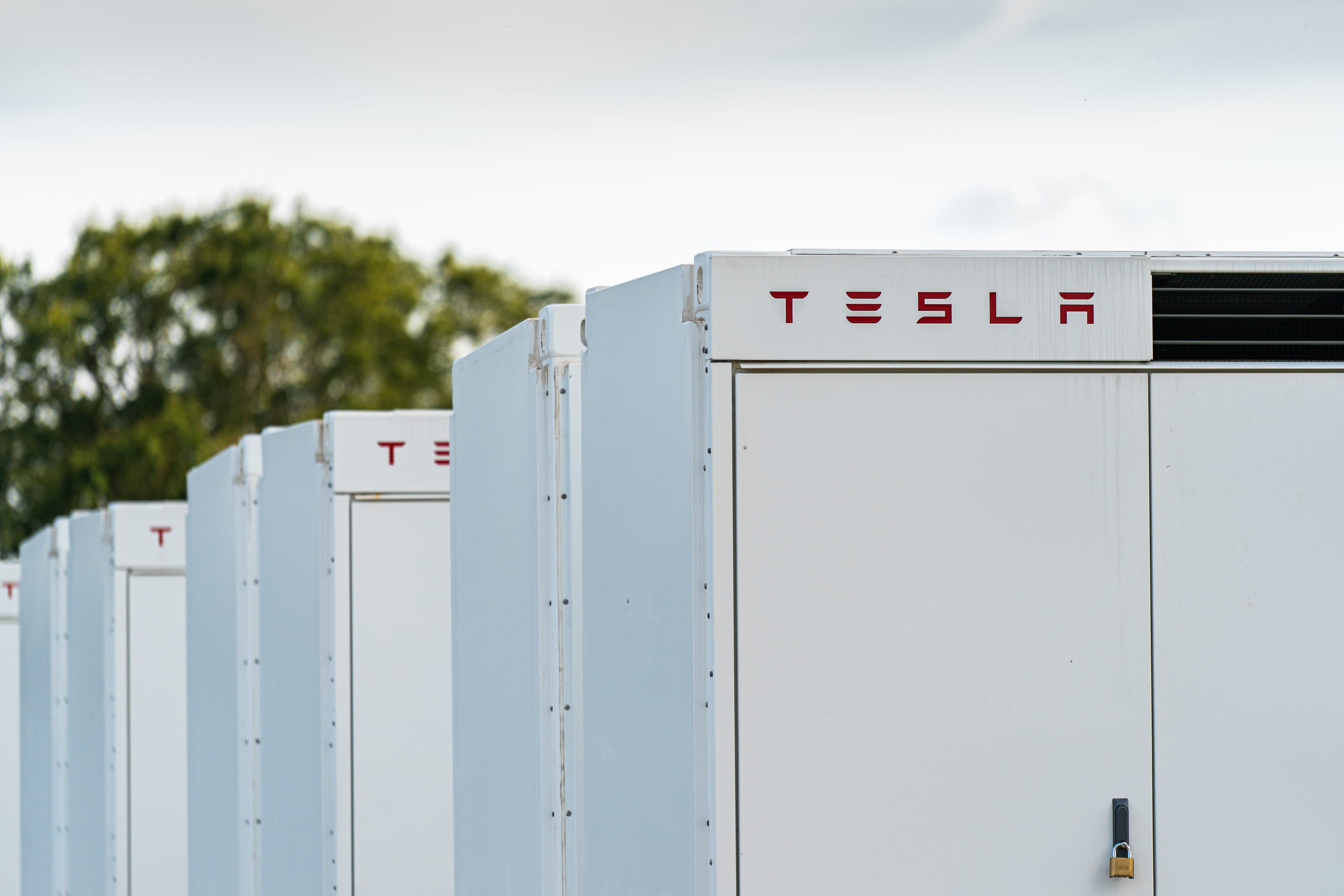 A row of 100MW Tesla batteries