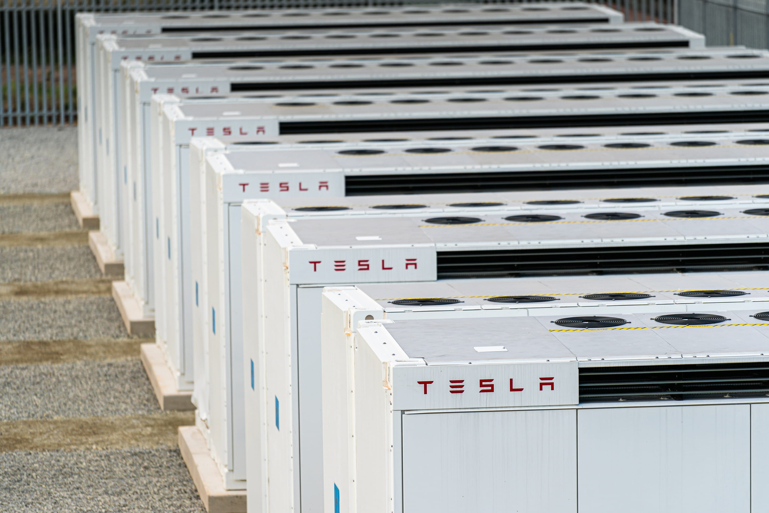 A row of 100MW Tesla batteries