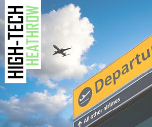 Plane flying over the departure sign at Heathrow airport, with text: 'High-Tech Heathrow'